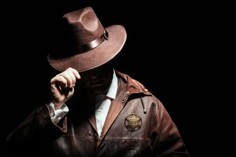 Sheriff in hat with badge. Stock Photos