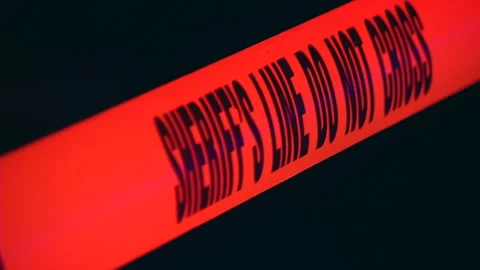 Sheriff Line Do Not Cross - police crime scene tape Stock Footage 219300525