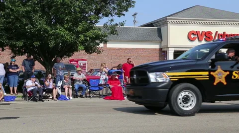 Sheriff's car in a 4th parade Stock Footage 51818869