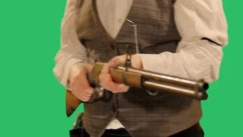 Sherriff advancing with Winchester - muzzle focus Stock Footage 94003298