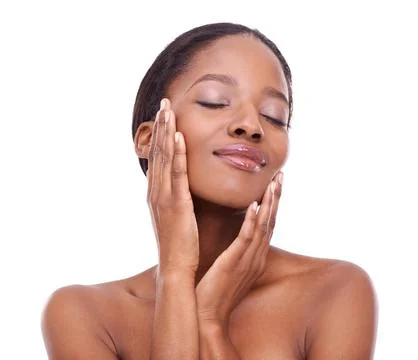 Shes dedicated to her skincare program. Studio shot of a beautiful young woman Stock Photos