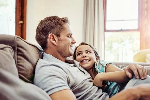 Shes the treasure of his life. a father and his little daughter bonding together Stock Photos