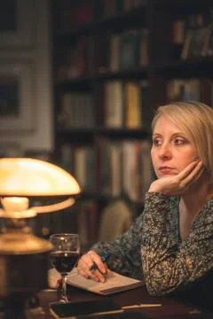 She's writing a book Stock Photos