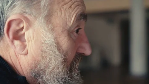 Shhh, old senior staring to camera and puts fingers to lips 4K Video stock 73050373