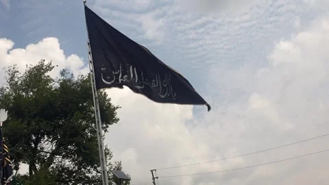 Shia Muslim flag and procession during Stock-Footage 282239853