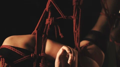 Shibari art with red ropes 動画素材 101473786