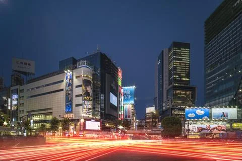 Shibuya Crossing Intersection in front of Shibuya Station on a summer night Stock Photos