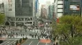 Shibuya Crossing Road Huge Crowd People Walking Tokyo Commercial Area Cloudy Day HD Footage
