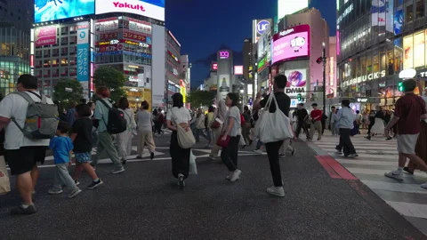 Shibuya intersection, crowded and traffic crossing the intersection Stock-Footage 278167653