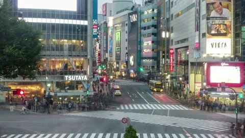 Shibuya intersection square with traffic and thoroughfare and crowded people  Stock Footage 201258658