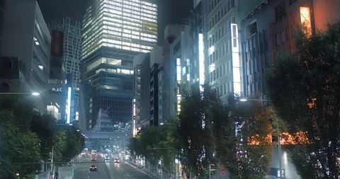 Shibuya skyscraper buildings at night in the rain 4K DCI cinematic slow motion Stock Footage