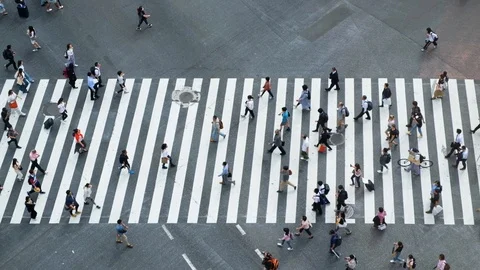 Shibuya, Tokyo, Japan - Aerial view of pedestrians walk at Shibuya Crossing. Stock Footage 113442937
