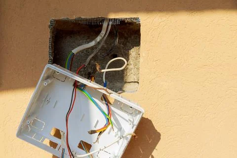 Shield With electrodes suspended on the work wall. Installation of an electri Stock Photos