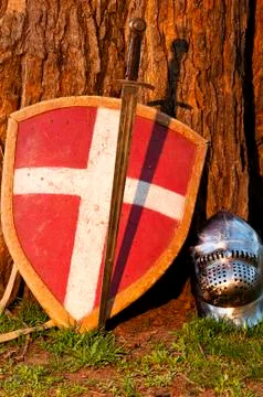 Shield, sword and the helmet Stock Photos