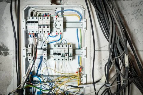 Shield in the wall of the house. wrong connection, automatic distribution, wi Stock Photos