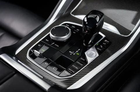 The shift of a car with the controls on it's control button Photos