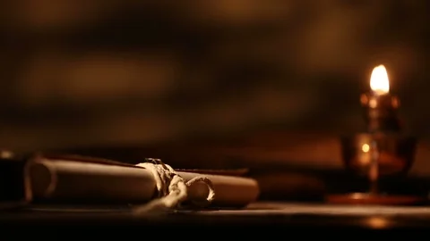 Shift focus from paper scroll to antique lantern Stock Footage 105317820