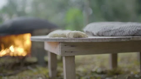Shift forcus between dough and fire inside an oven, traditional Lebanese bread Stock Footage 134292865
