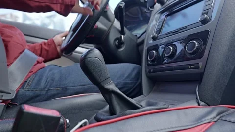 Shifting down in a manual car to slow down. Stock Footage 329165061