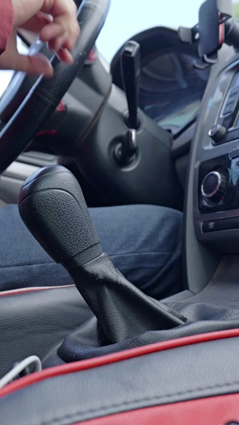 Shifting down in a manual car to slow down. Stock Footage 329168541