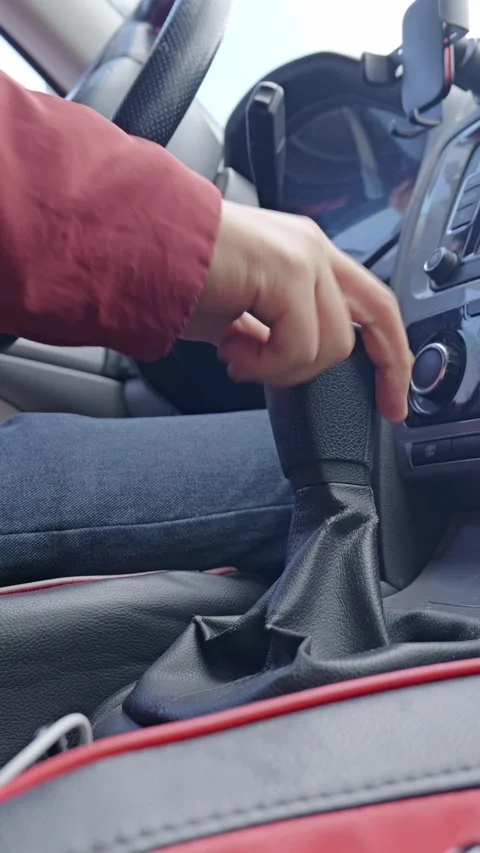 Shifting down in a manual car to slow down. Stock Footage 329397004