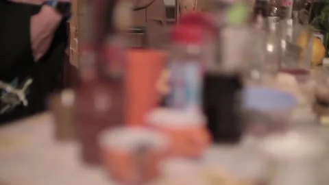 Shifting of focus from and on different objects standing on the table. Gala Stock-Footage 141466101