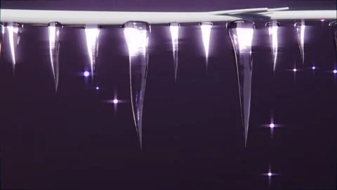Shifting light revealing row of clear icicles growing in closeup on white rod Stock Footage 340268343