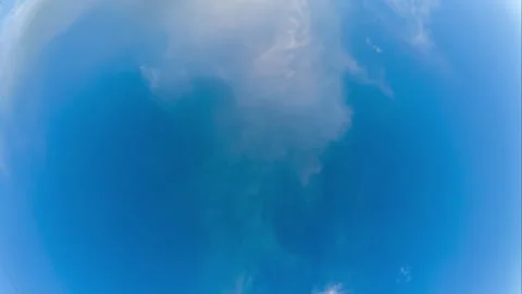 Shifting time lapse of deep blue sky with soft cloud motion. Timelapse bright Stock Footage 318668421