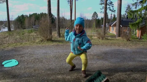 Сhild playing outside in  home yard Stock Footage 67279032