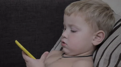 Сhild with a Smartphone hands Stock Footage 42369234