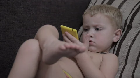 Сhild with a Smartphone hands Video stock 42369277