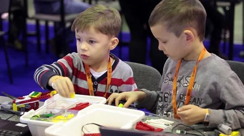 Сhildren build constructor blocks Stock Footage 68185127