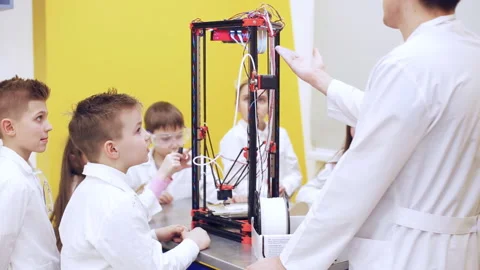 Сhildren at school are studying a 3d printer Stock Footage 88267419
