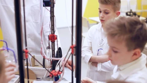 Сhildren at school are studying a 3d printer Stock Footage 88912077