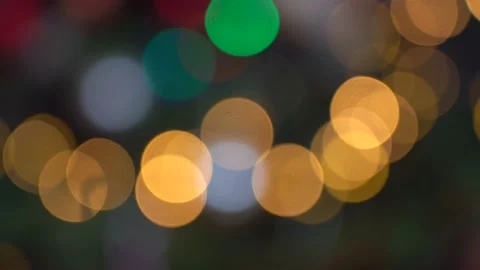 Shimmering abstract colored circles defocused christmas lights 4k video Stock Footage 138076162