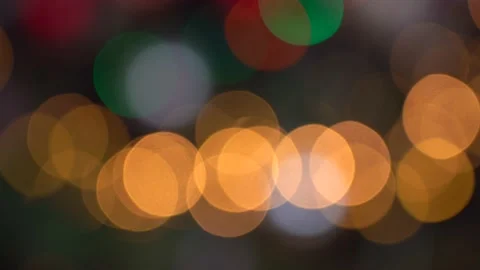 Shimmering abstract colored circles defocused christmas lights 4k video Stock Footage 138076262