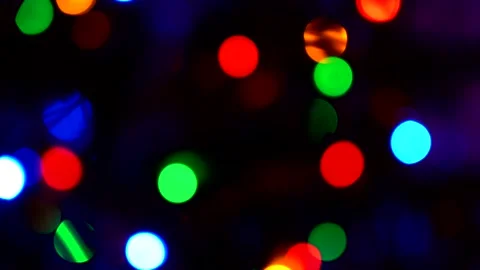 Shimmering abstract colored circles defocused christmas lights background.  Stock Footage 143075717