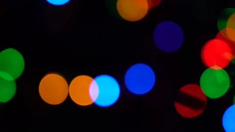Shimmering abstract colored circles defocused christmas lights background.  Stock Footage 143075757