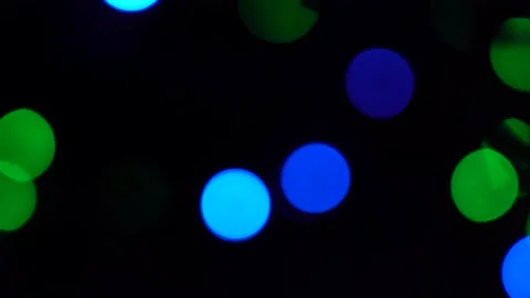 Shimmering abstract colored circles defocused christmas lights background.  Stock Footage 143075762