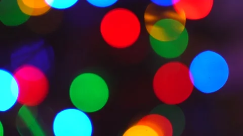 Shimmering abstract colored circles defocused christmas lights background.  Stock Footage 143075766