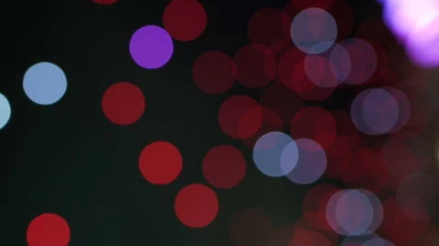 Shimmering abstract colored circles defocused christmas lights background Stock Footage 143379283