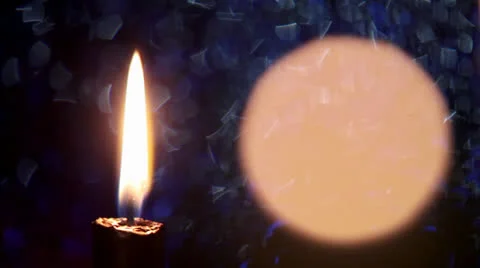 Shimmering candle light, moving light spot at night Video stock 23724842
