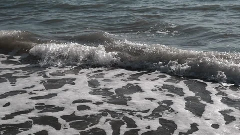 Shimmering Dirty Sea Waves Lapping the Surface of the Water in the Aegean Sea Stock Footage 313873834