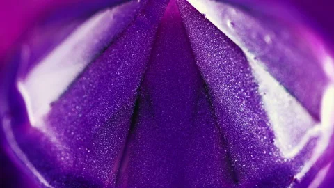 Shimmering fluid shiny ink flow purple pyramid Video stock 267054107