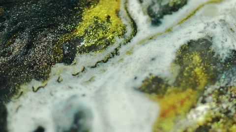 Shimmering fluid wave paint drip white yellow mix Stock Footage 278439069