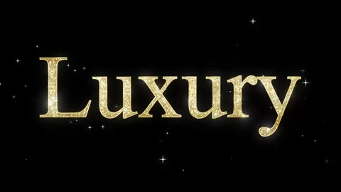 Shimmering Gold Glitter Text Animation on Black Background with Starry Effect Stock Footage 325950324