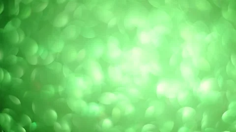 Shimmering green bokeh background with focus changes, perfect for holiday. Stock Footage 293743401