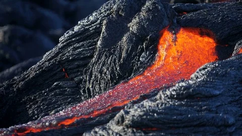 Shimmering heat from high temperature flow of slow moving volcanic lava Hawaii Stock Footage 74670628