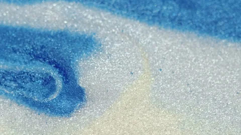 Shimmering ink flow fluid pouring blue white paint Video stock 264961862