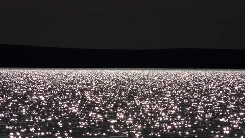 Shimmering light reflections - Glittering Highlights and Bright Reflections Stock Footage 339697627